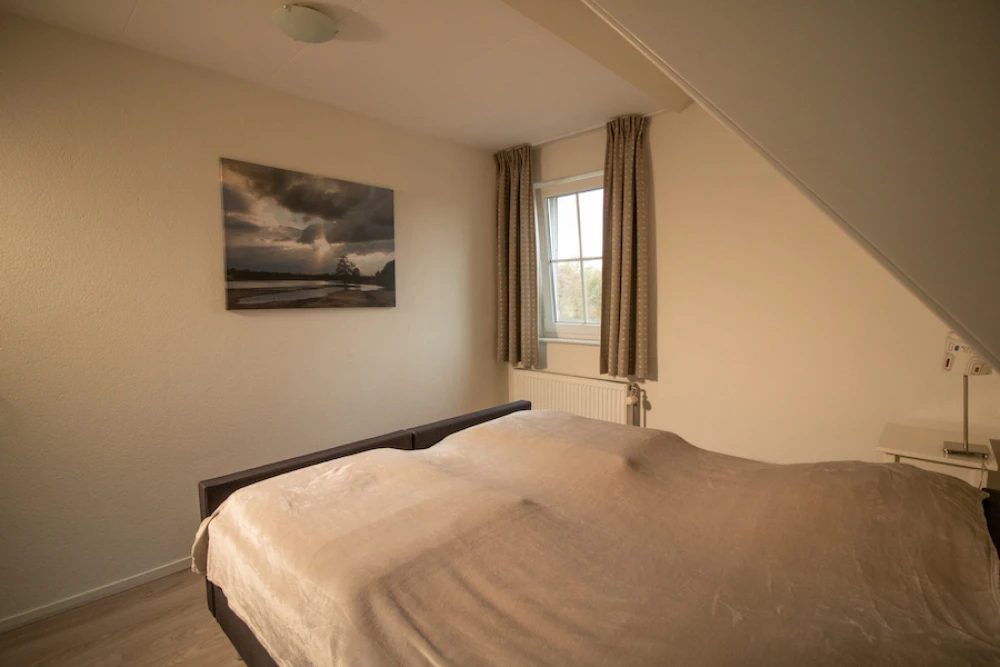 Slaapkamer in Aurora – comfortabele inrichting voor 5 personen, ideaal voor een verblijf in de Achterhoek.
