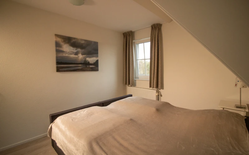 Slaapkamer in Aurora – comfortabele inrichting voor 5 personen, ideaal voor een verblijf in de Achterhoek.