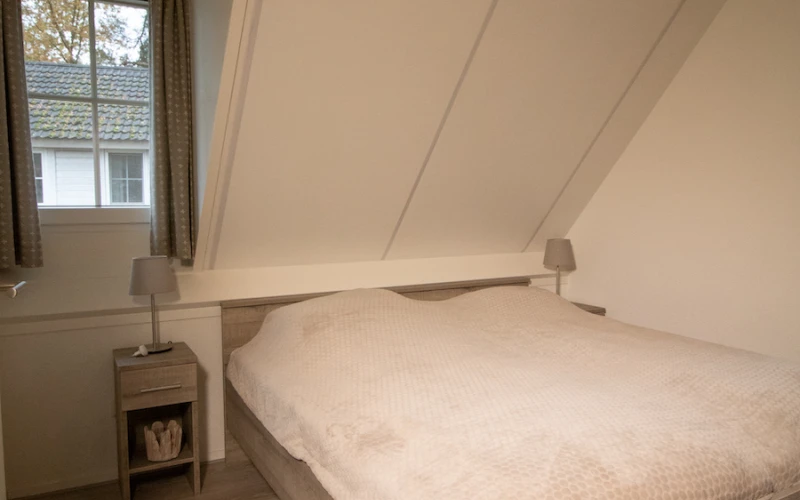 Slaapkamer in Aurora – comfortabele inrichting voor 5 personen, ideaal voor een verblijf in de Achterhoek.