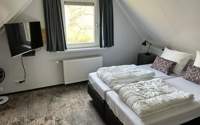 Slaapkamer in Borboleta – comfortabele inrichting voor 5 personen, ideaal voor een verblijf in de Achterhoek.